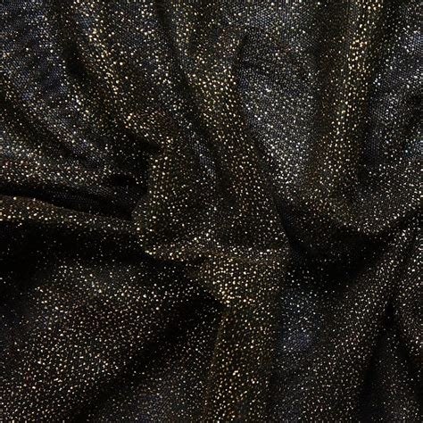 gold metallic stars on black fabric|black fabric with gold metallic.